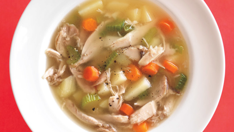 Healthy chicken soup with fresh vegetables